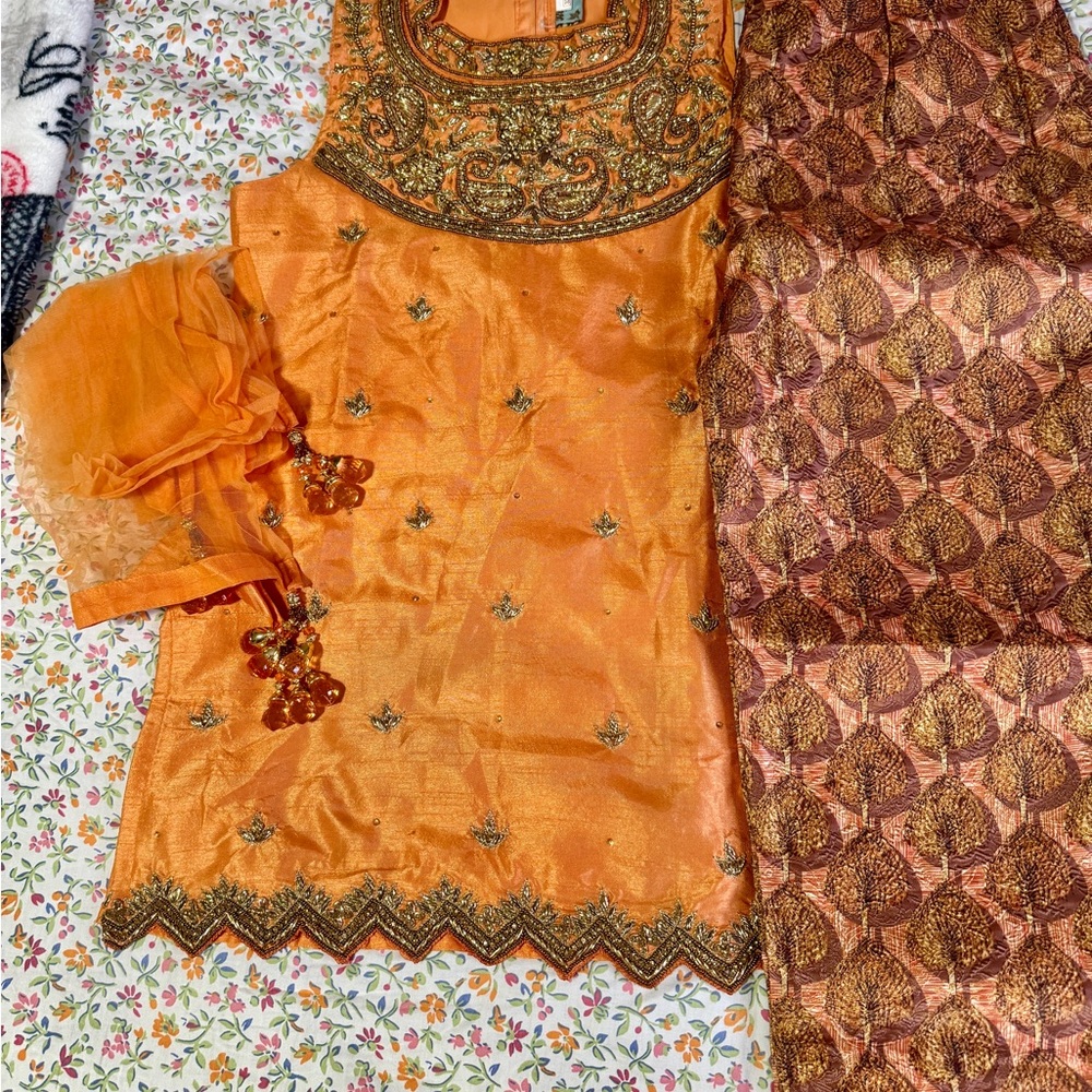 Elegant Orange Embroidered big girls Indian suit